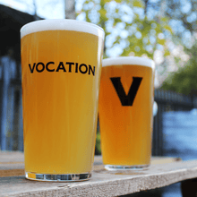 Load image into Gallery viewer, Vocation Conical Pint Glass - Vocation Brewery
